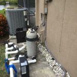 Pool pump and installed spa heater
